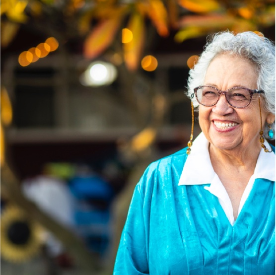 Stock photo of an older woman smiling.